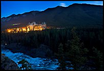 Banff Springs Hotel, Bow River and Falls at night. Banff National Park, Canadian Rockies, Alberta, Canada (color)