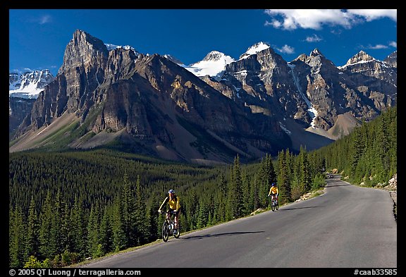 Cyclists on the road to the Valley of Ten Peaks. Banff National Park, Canadian Rockies, Alberta, Canada (color)