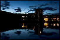 Chateau Lake Louise Hotel reflected in Lake at night. Banff National Park, Canadian Rockies, Alberta, Canada (color)