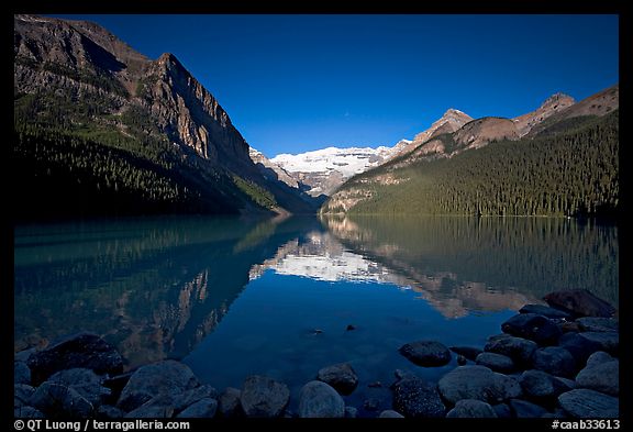Mountains reflected in Lake Louise, early morning. Banff National Park, Canadian Rockies, Alberta, Canada