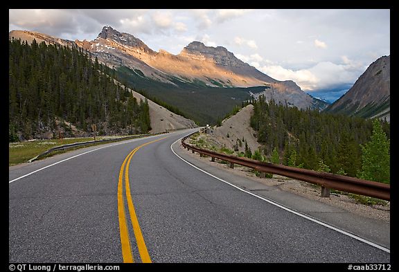 Twisting road, Icefields Parkway, sunset. Banff National Park, Canadian Rockies, Alberta, Canada