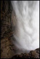 Curtain of water of Panther Falls, seen from behind. Banff National Park, Canadian Rockies, Alberta, Canada