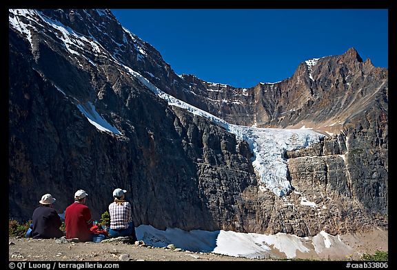 Hikers looking at Angel Glacier and Cavell Glacier. Jasper National Park, Canadian Rockies, Alberta, Canada