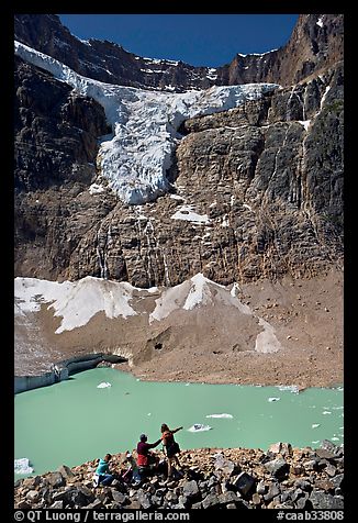 Family looking at Cavell Pond and Angel Glacier. Jasper National Park, Canadian Rockies, Alberta, Canada