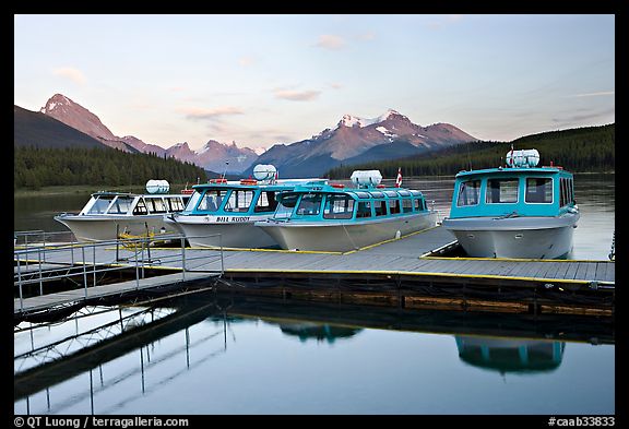 Tour boat dock, Maligne Lake, sunset. Jasper National Park, Canadian Rockies, Alberta, Canada (color)