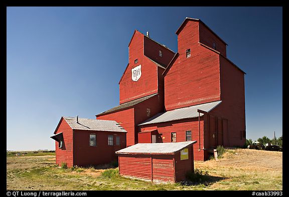 Red wooden grain elevator building. Alberta, Canada