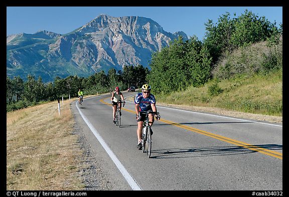 Cyclists on road. Waterton Lakes National Park, Alberta, Canada