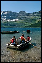 Families boating in Cameron Lake. Waterton Lakes National Park, Alberta, Canada (color)