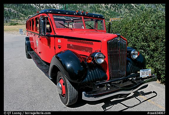 Red antique busses from Glacier National Park. Waterton Lakes National Park, Alberta, Canada