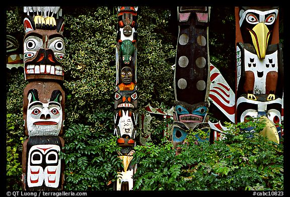 Totem collection, near the Capilano suspension bridge. Vancouver, British Columbia, Canada (color)