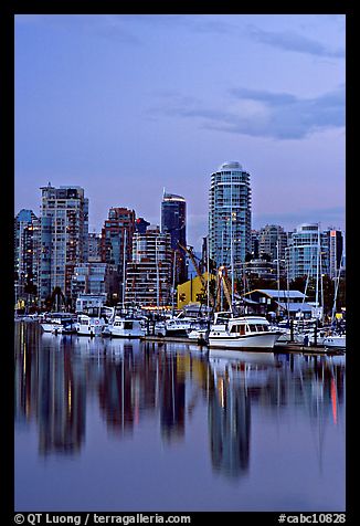 Small boat harbor and skyline at dusk. Vancouver, British Columbia, Canada