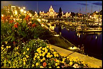 Flowers, inner harbour, and lights at night. Victoria, British Columbia, Canada ( color)