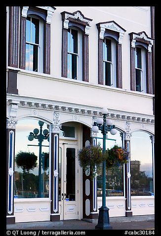 Store with reflections in windows. Victoria, British Columbia, Canada (color)