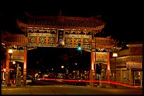 Gate of Harmonious Interest marking the entrance of Chinatown, night. Victoria, British Columbia, Canada ( color)