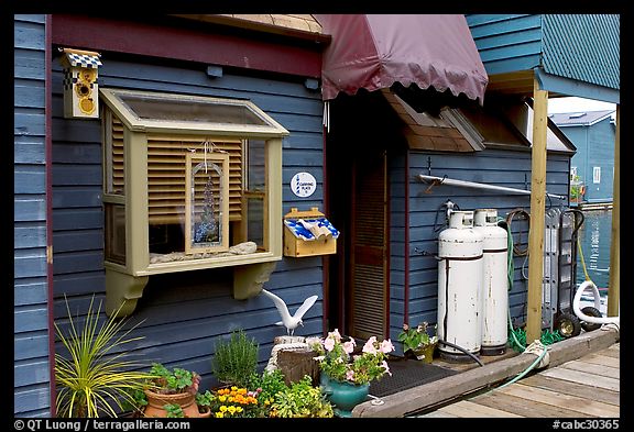 Houseboat window and propane tanks. Victoria, British Columbia, Canada (color)
