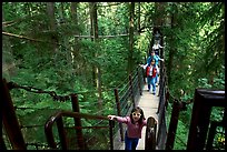 Kid on treetop trail. Vancouver, British Columbia, Canada (color)