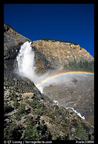 Rainbow formed in the mist of Takakkaw Falls. Yoho National Park, Canadian Rockies, British Columbia, Canada (color)