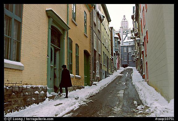 Narrow street partly covered with snow, Quebec City. Quebec, Canada (color)