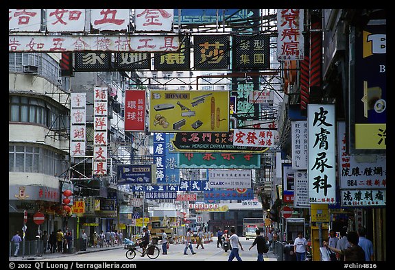 Street in Kowloon with signs in Chinese. Hong-Kong, China (color)