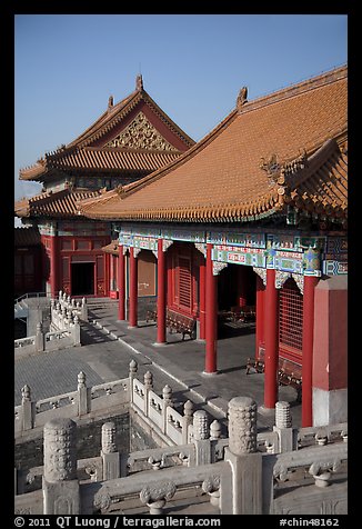 Pavilion with red columns and yellow roof tiles typical of imperial architecture, Forbidden City. Beijing, China (color)