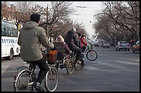 Bicyles and cyclo on street. Beijing, China ( color)