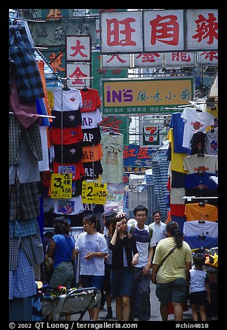 Crowded alley with clothing vendors, Kowloon. Hong-Kong, China (color)