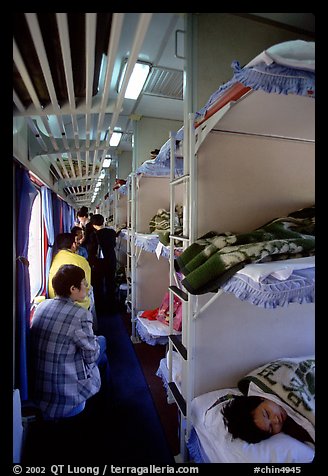 Inside a hard sleeper car train.  (color)