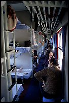 Inside a hard sleeper car train. (color)
