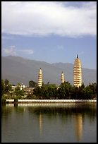 San Ta Si (Three pagodas) reflected in a lake, early morning. Dali, Yunnan, China ( color)