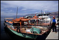Boats on a pier of Erhai Lake. Dali, Yunnan, China (color)
