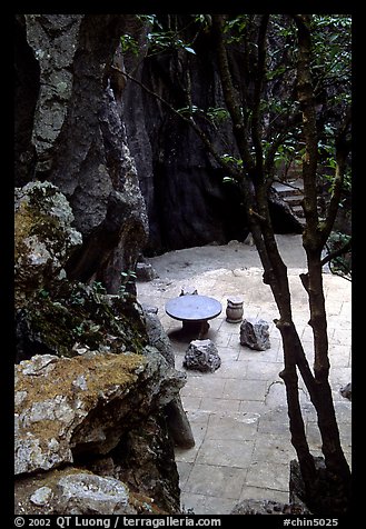 Quiet courtyard between limestone pillars. Shilin, Yunnan, China