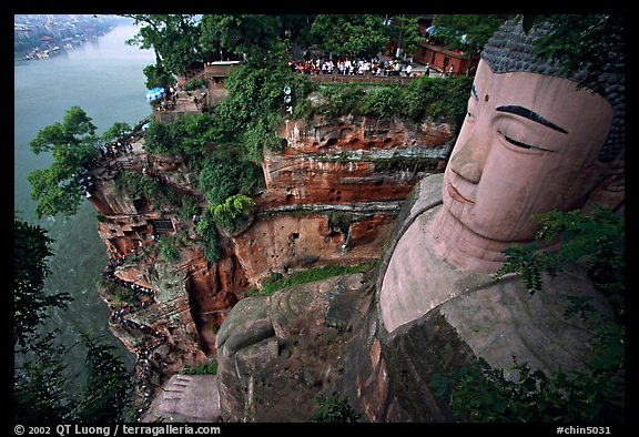 Da Fo (Grand Buddha) with staircase in cliffside and river in the background. Leshan, Sichuan, China