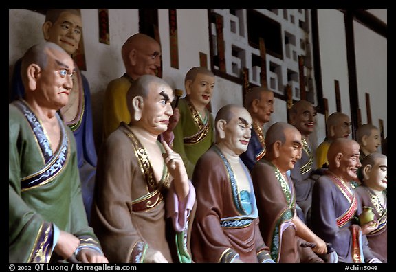 A variety of postures and expressions of some of the 1000 Terracotta arhat monks in Luohan Hall. Leshan, Sichuan, China