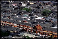 Rooftops of the old town seen from Wangu tower. Lijiang, Yunnan, China (color)