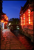 Cobblestone street and canal at night. Lijiang, Yunnan, China ( color)