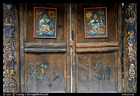 Decorated doors of a temple. Lijiang, Yunnan, China (color)