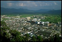 Old town, new town, and surrounding fields seen from Wangu tower. Lijiang, Yunnan, China (color)