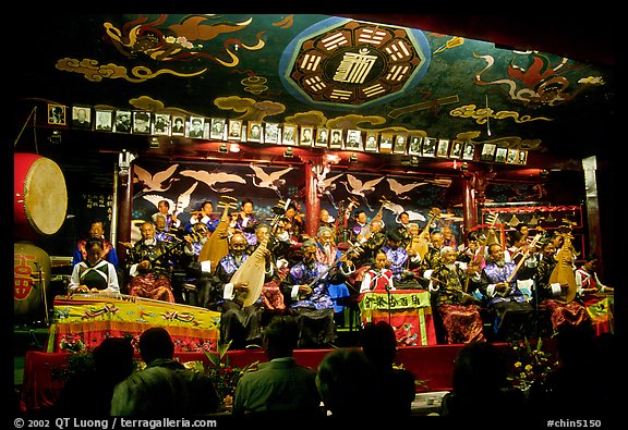 Naxi orchestra in Dayan Naxi concert hall. Lijiang, Yunnan, China (color)