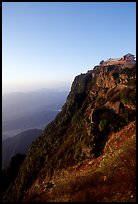 Sunrise on Jinding Si (Golden Summit), perched on a steep cliff. Emei Shan, Sichuan, China (color)
