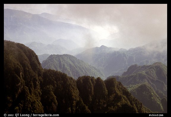 Forest-covered slopes and ridges of Emei Shan. Emei Shan, Sichuan, China