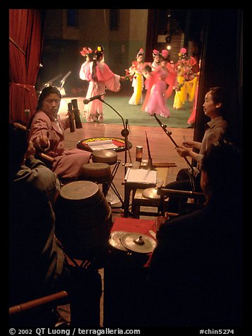 Sichuan opera performers and musicians seen from the backstage. Chengdu, Sichuan, China (color)