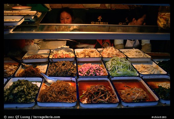 Food stall by night. Sichuan food is among China's spiciest. Chengdu, Sichuan, China