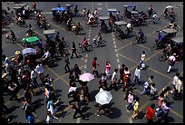 Pedestrians and bicyclists cross a major avenue. Chengdu, Sichuan, China ( color)
