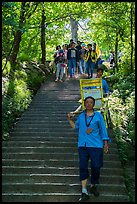Sedan chair carriers on steep staircase. Huangshan Mountain, China ( color)