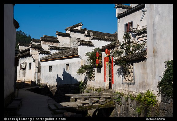 Street with bridges over stream. Xidi Village, Anhui, China