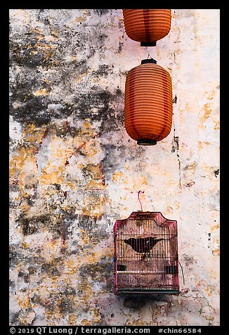 Caged bird and lanterns. Xidi Village, Anhui, China (color)