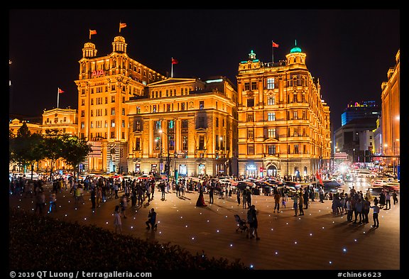 Colonial-area buildings illuminated at night, the Bund. Shanghai, China (color)