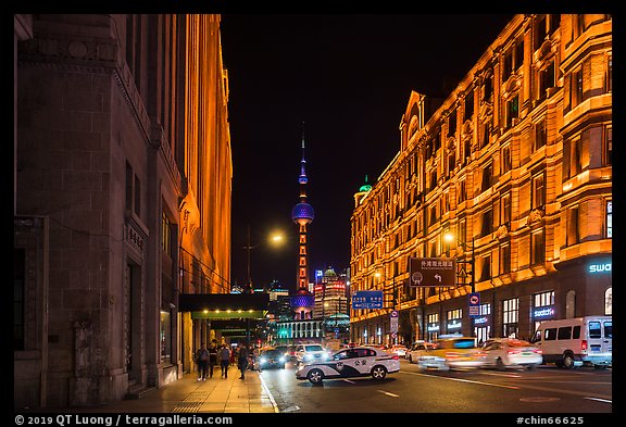 Colonial buildings and Oriental Pearl Tower at night. Shanghai, China (color)