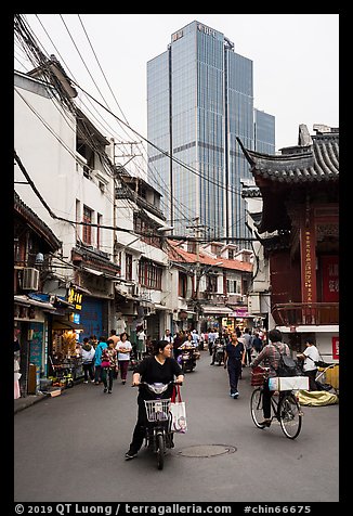 Old street and modern tower. Shanghai, China