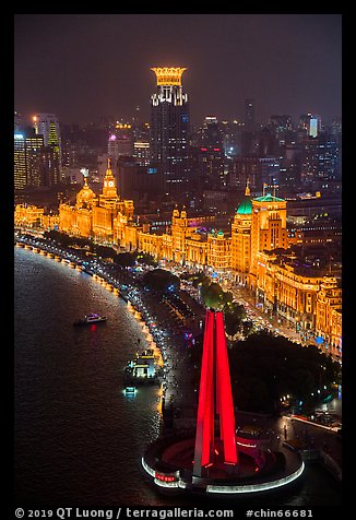 Peoples Memorial and illuminated Bund buildings at night from above. Shanghai, China (color)